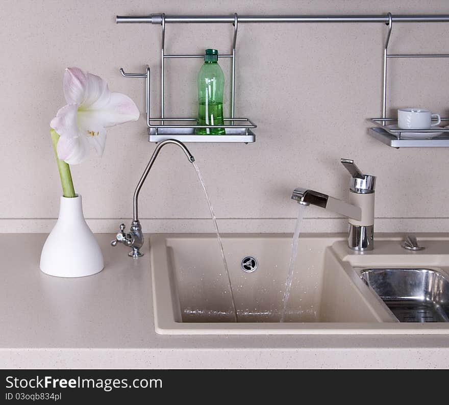 Amaryllis flower in kitchen interior. Amaryllis flower in kitchen interior