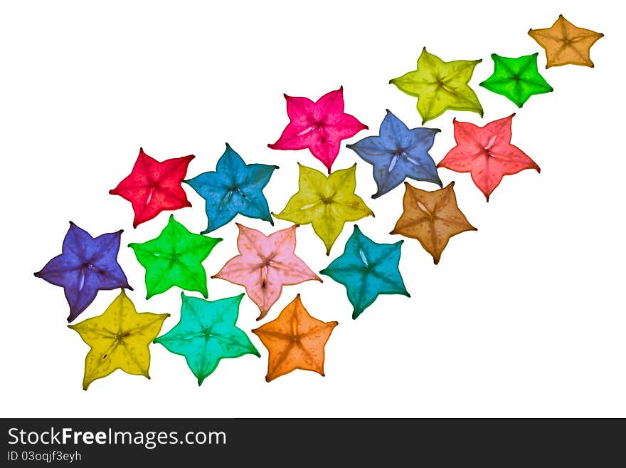 Colorful star fruit is used as the background. Colorful star fruit is used as the background