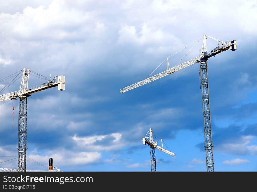 Three cranes in an are under development