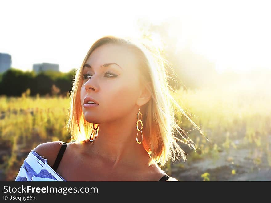 Attractive young girl in beautiful sunshine