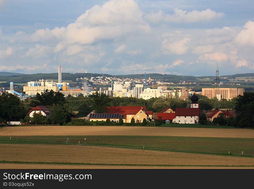 Grassland with the city schwandorf in the background