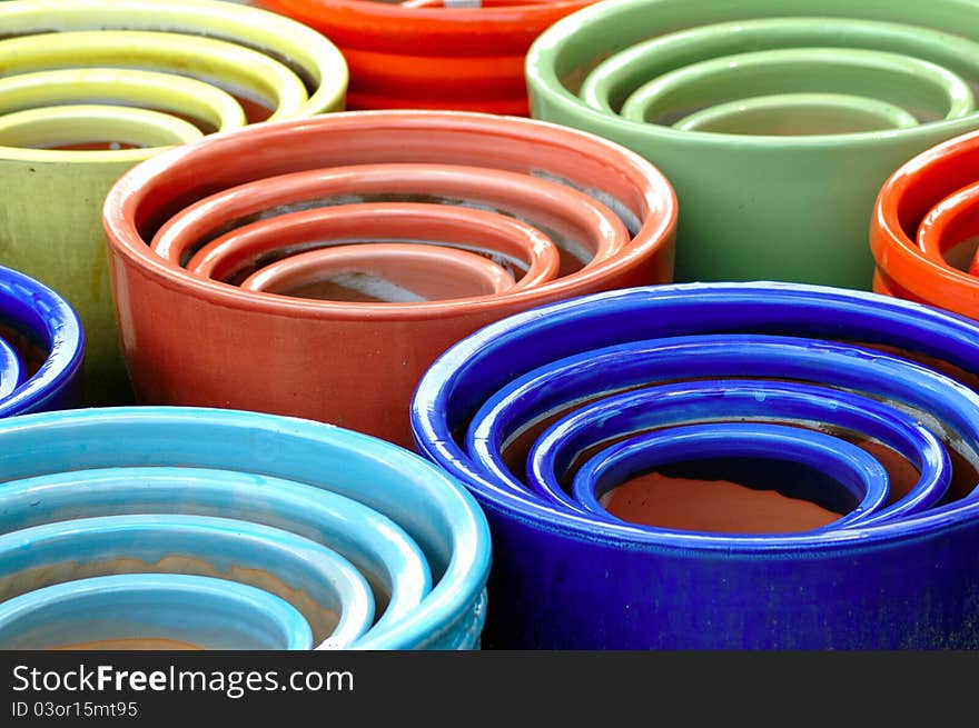 Colorful round terra cotta pots. Colorful round terra cotta pots