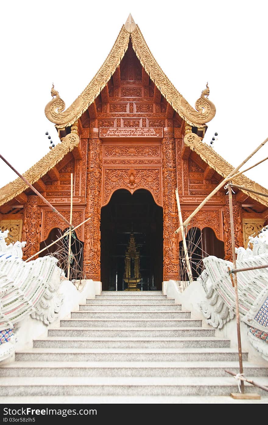 Temple made from teak under construction. Temple made from teak under construction.