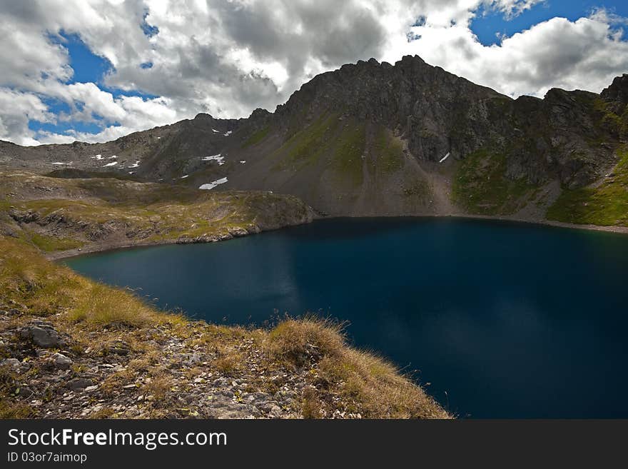 Picol Lake. The biggest lake in the Italian mountains situated at an altitude of 2390 meters on the sea-level. Picol Lake. The biggest lake in the Italian mountains situated at an altitude of 2390 meters on the sea-level