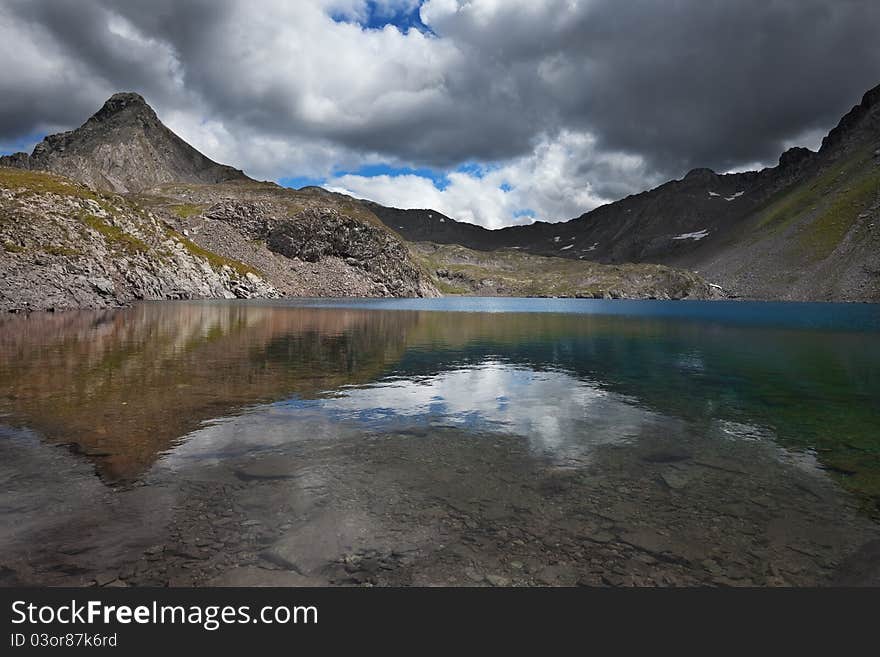 Picol Lake. The biggest lake in the Italian mountains situated at an altitude of 2390 meters on the sea-level. Picol Lake. The biggest lake in the Italian mountains situated at an altitude of 2390 meters on the sea-level