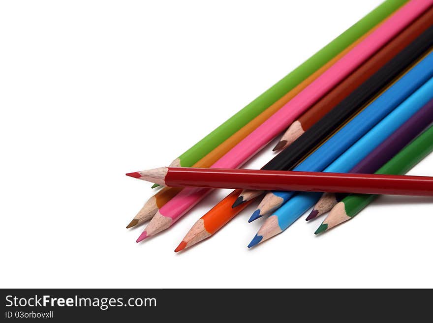 Isolated coloured pencils on a white background