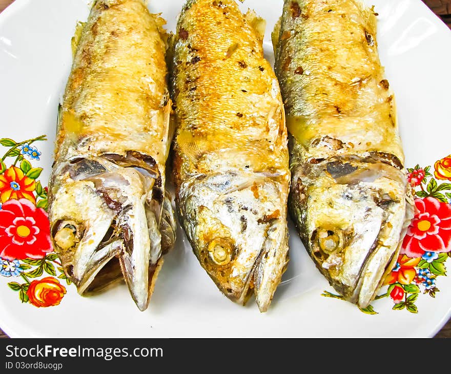 Three fried mackerel