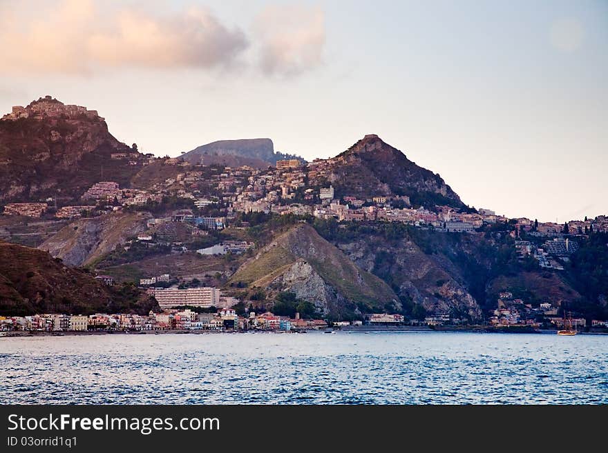 Sicilian town Taormina on sunset