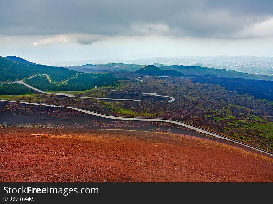 Serpentine road on slope of volcano Etna, Sicily, Italy