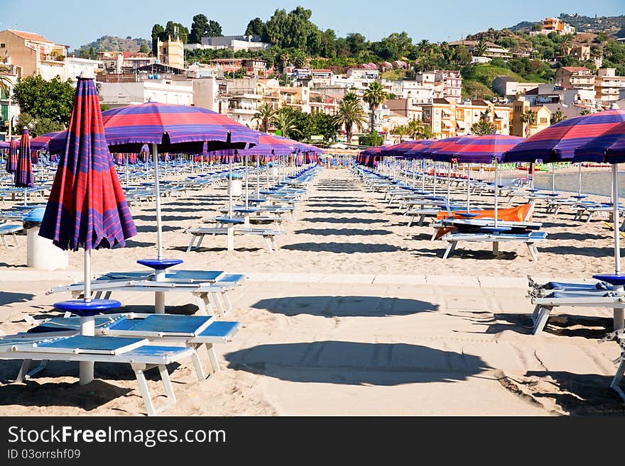 Urban sand beach in resort Giardini Naxos, Sicily. Urban sand beach in resort Giardini Naxos, Sicily