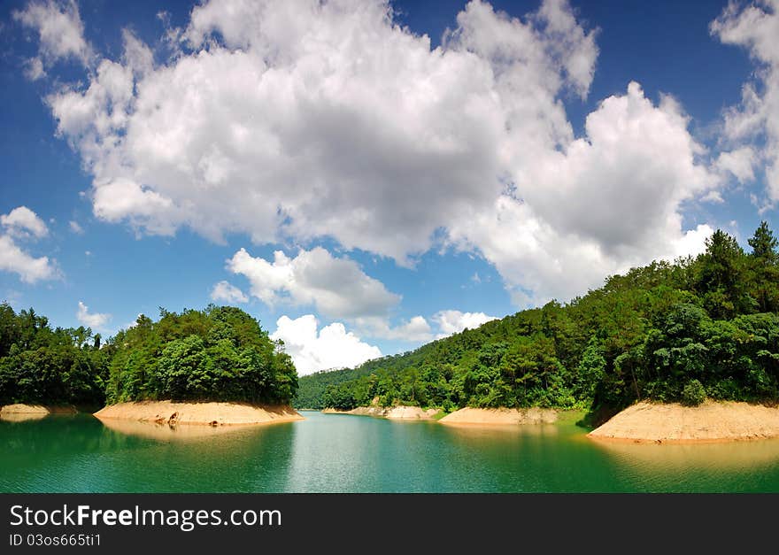 Green water and blue sky