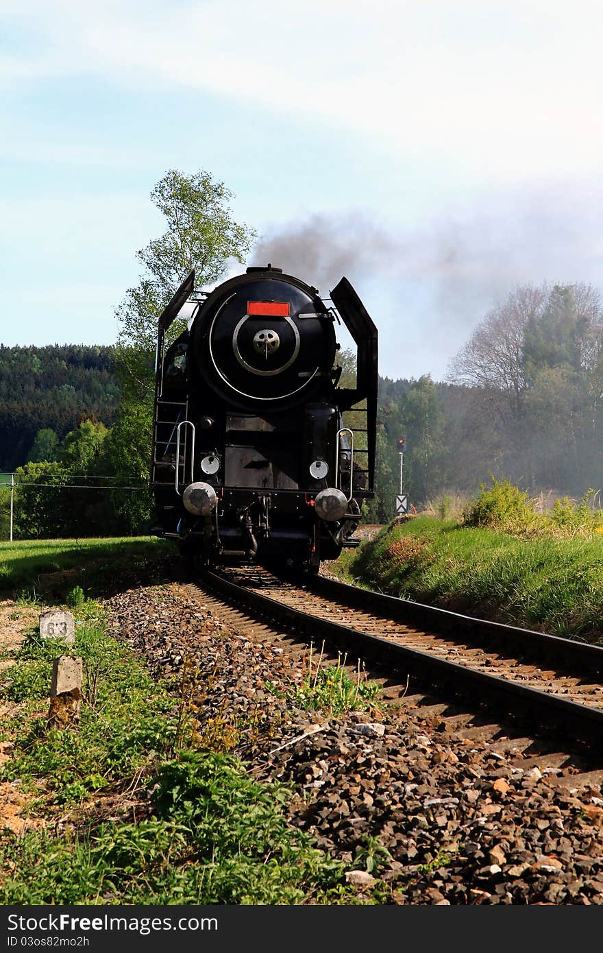 Old black lokomotive in running. Old black lokomotive in running