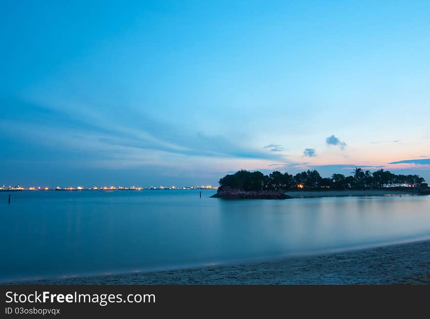 Small Tropical Island At Dusk