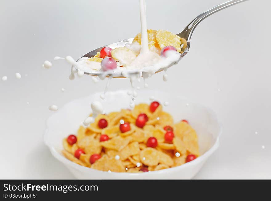 Corn flakes with milk splash