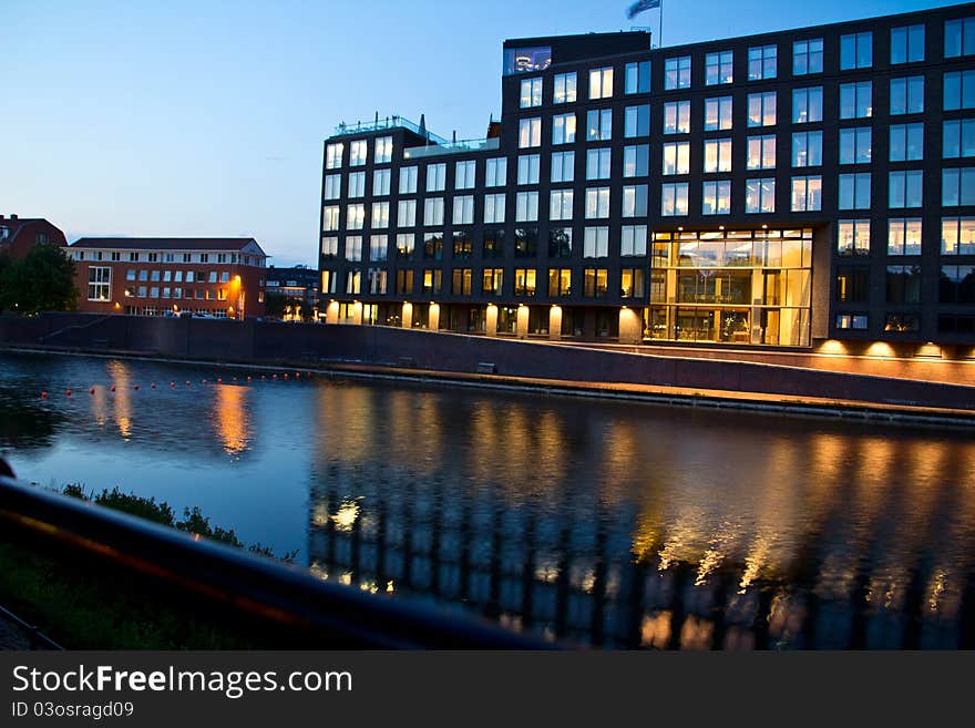 An office building beside the river. An office building beside the river