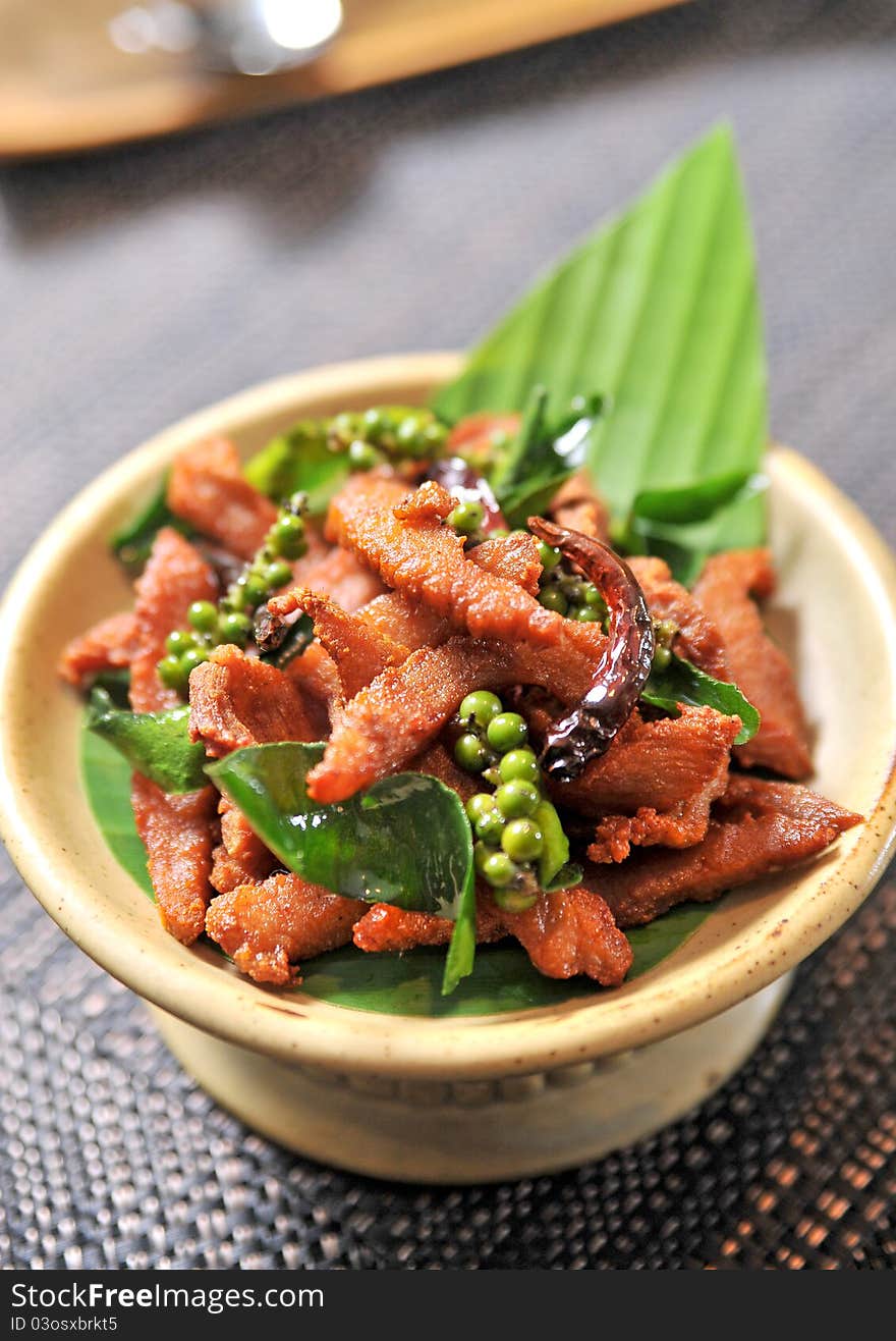 Fried pork thai style with herb