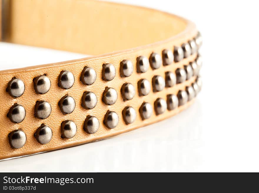 Leather belt decorated with metal beads. Leather belt decorated with metal beads