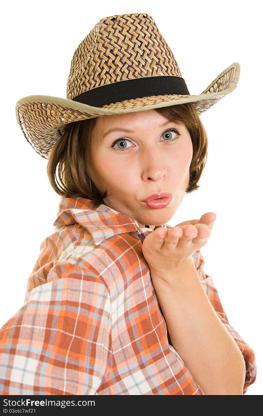 Woman cowboy sends a kiss.