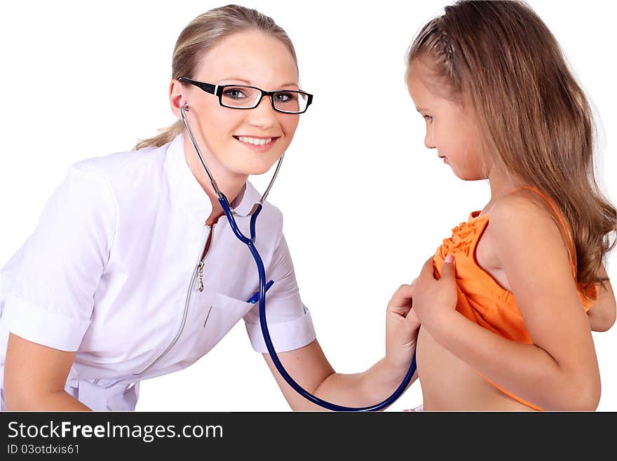 Young female doctor doing medical examination to a child