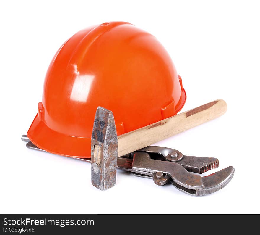 Color photo of a wrench and helmet. Color photo of a wrench and helmet