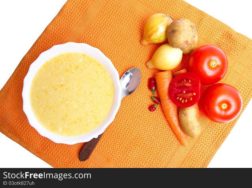 Soup pureed vegetables on orange napkin