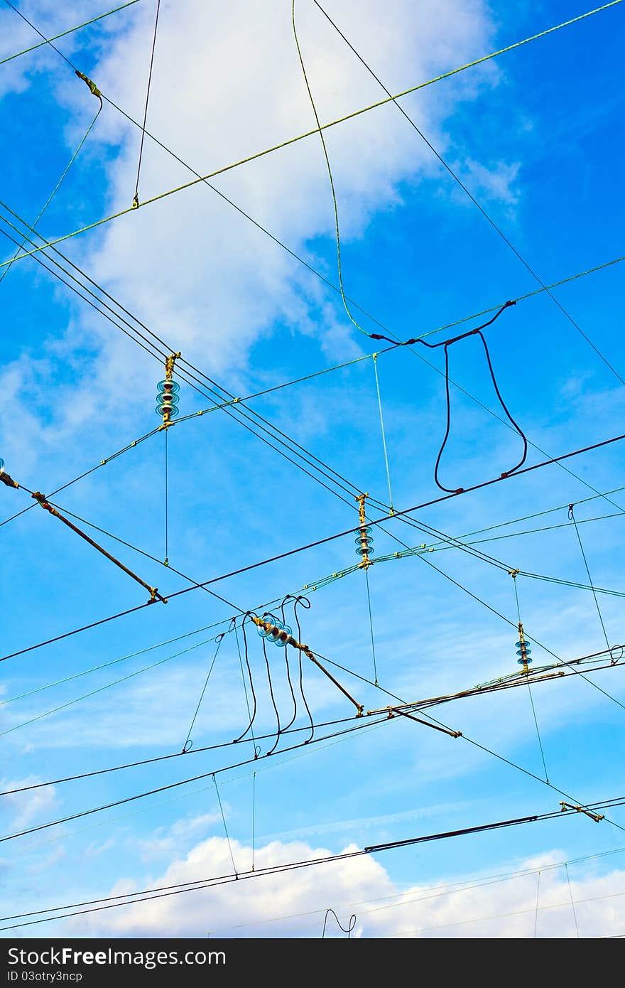 Catenary in winter at the station with blue sky