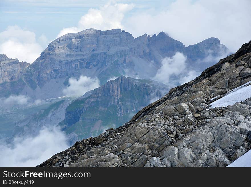 The layers of different types of stones in the picture can say a lot about the history of Alps