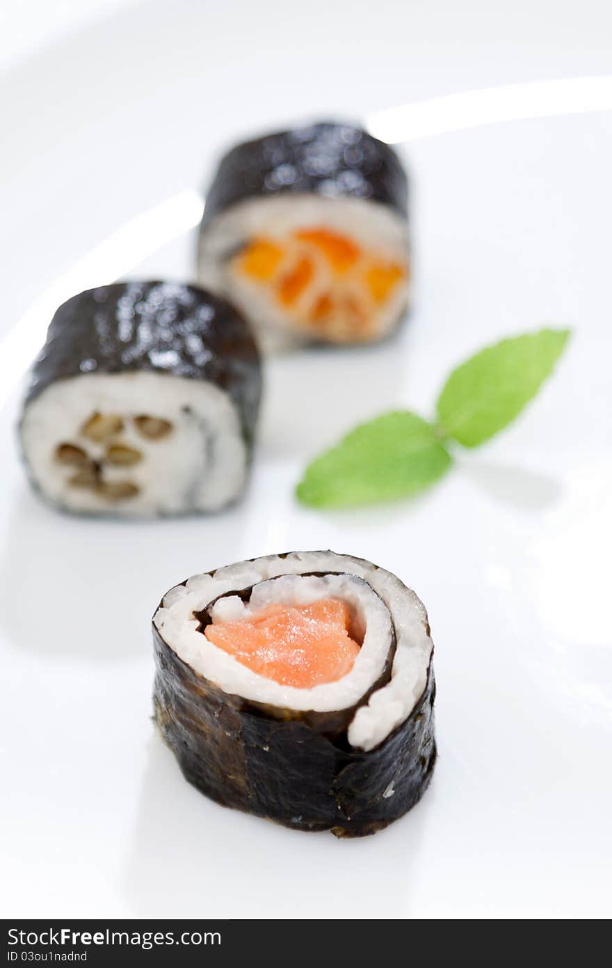 Sushi pieces on a white background