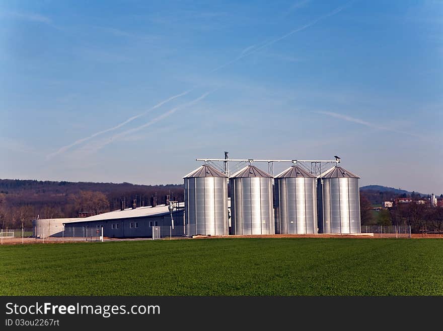 Silo in beautiful landscape in sun