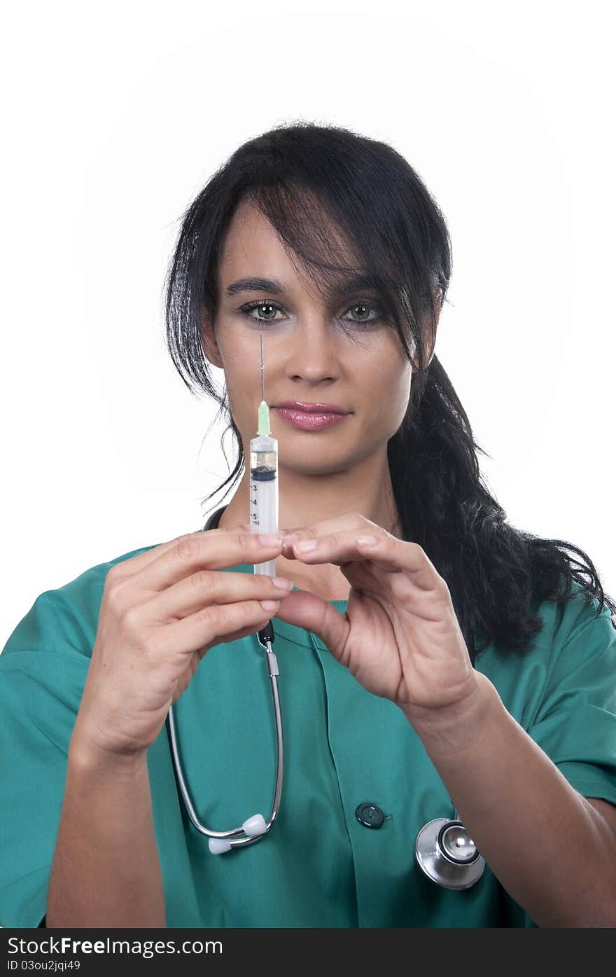 Beautiful nurse with syringe on white background