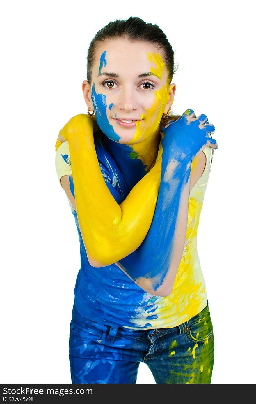 Young woman covered with paint looking at camera. Young woman covered with paint looking at camera