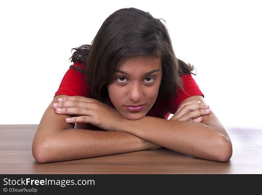 Melancholy brunette teenage girl on white background