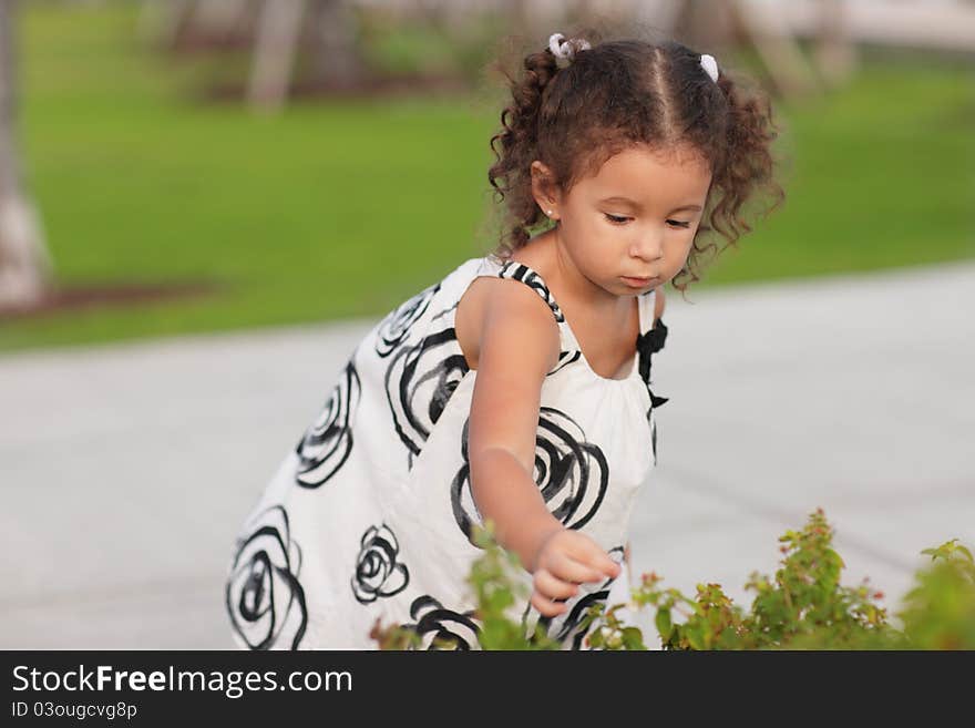 Child picking flowers