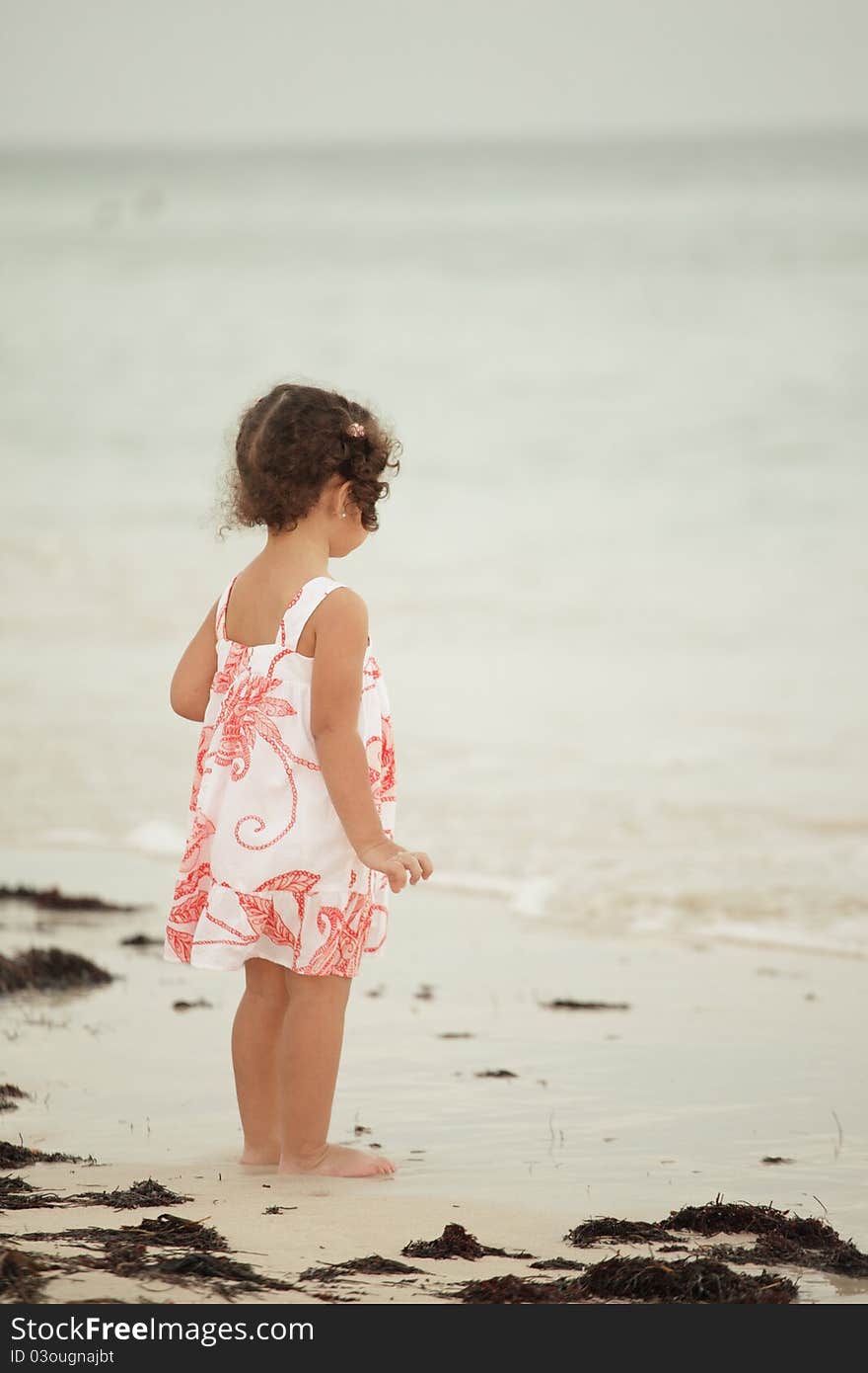 Toddler On The Beach