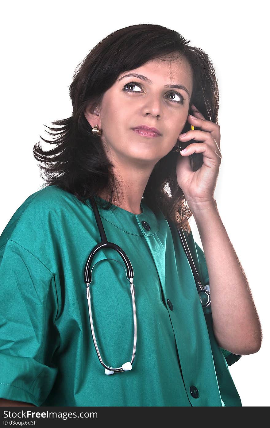 Female doctor talking on the phone on white background