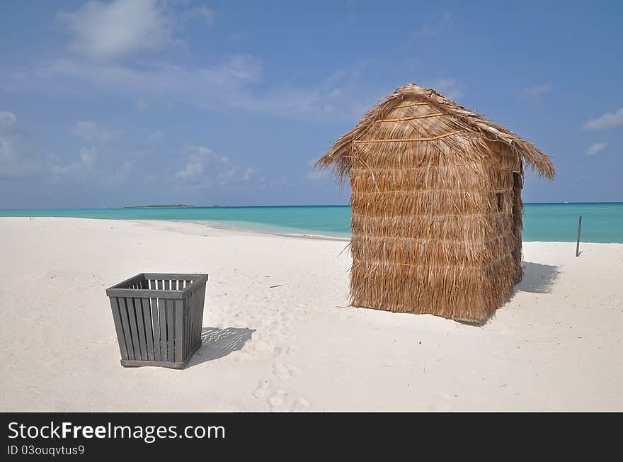 Grass hut on a tropical island in the indian ocean. Grass hut on a tropical island in the indian ocean