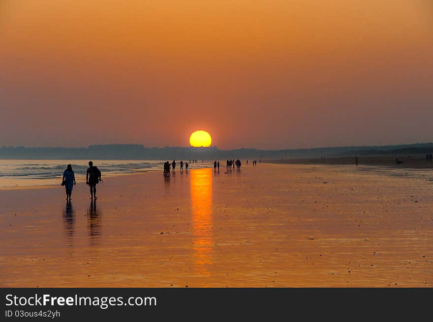 Orange sunset on the long beach