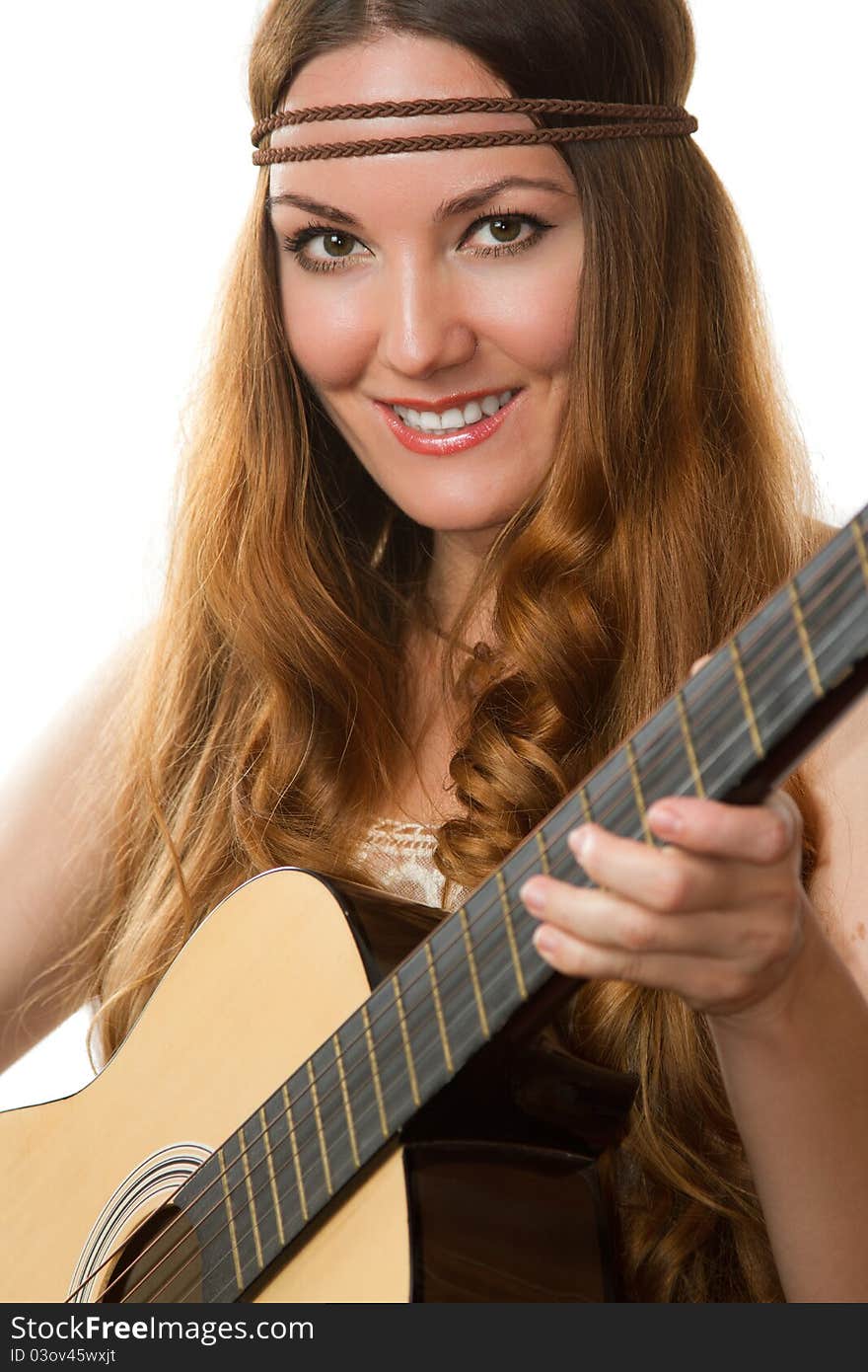 Smiling girl with a guitar