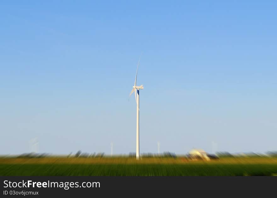 Wind mill in a blured field