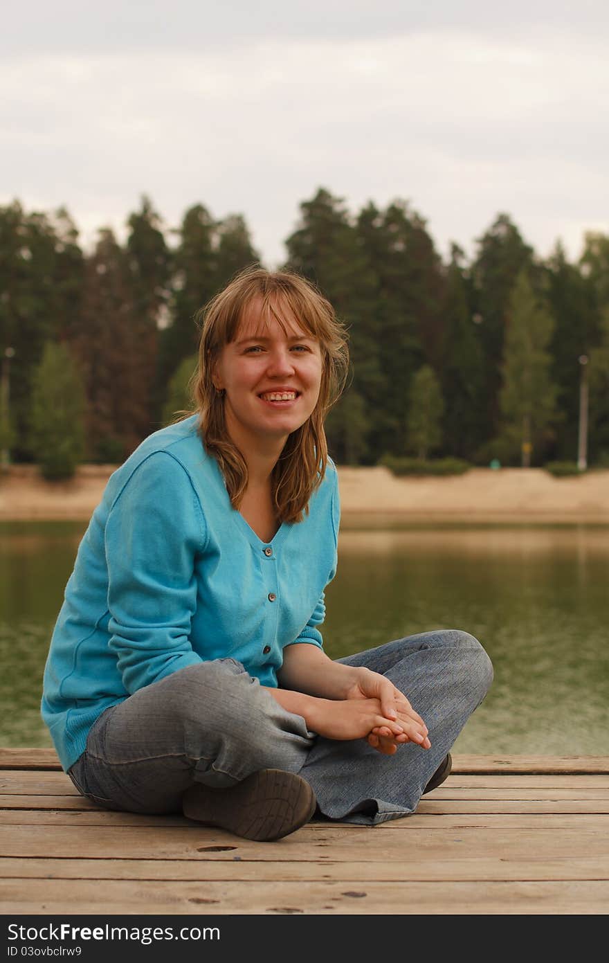 Young woman on jetty