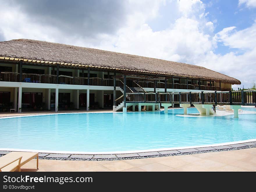 A relaxing luxury resort swimming pool. A relaxing luxury resort swimming pool