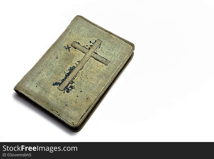 Old books cover on it a crucifix on white background