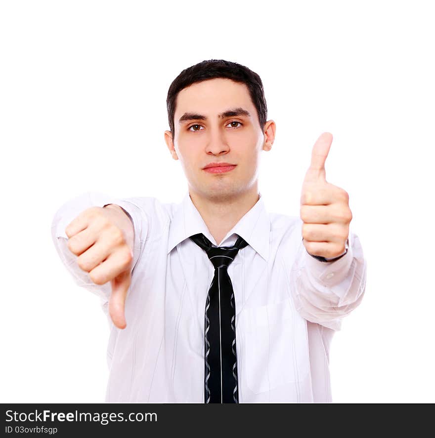 Businessman holding one thumb up and another down