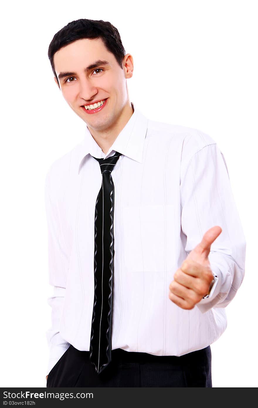 Young smiling businessman showing OK sign isolated over white