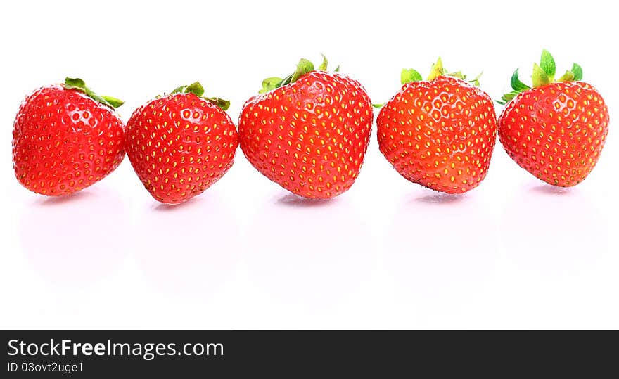 Close Up of fresh strawberry berries on white background