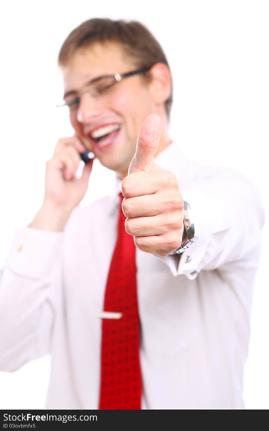 Young Businessman shows OK sign while calling by phone