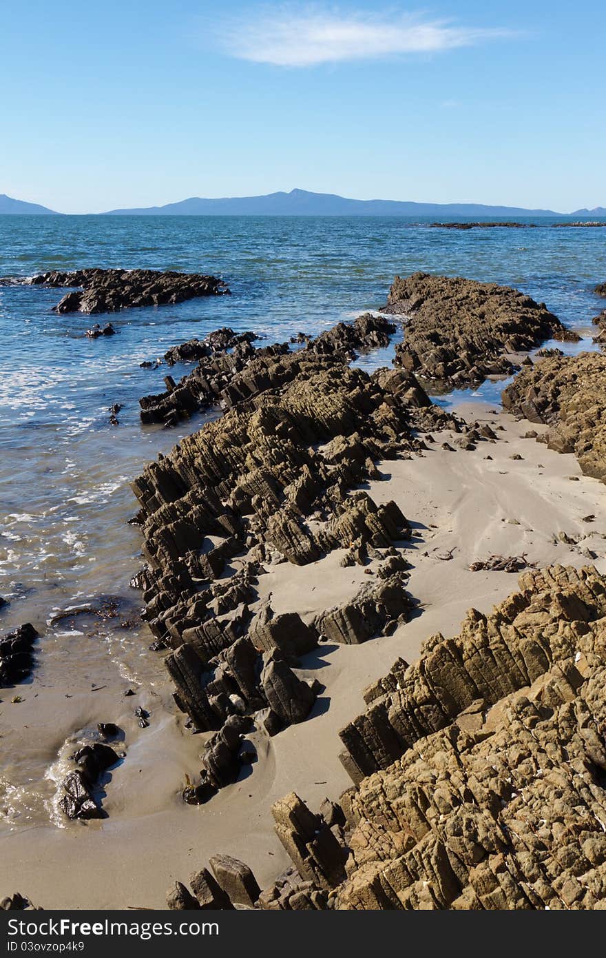 Rocky beach near Triabunna, Tasmania, in Australia. Rocky beach near Triabunna, Tasmania, in Australia.