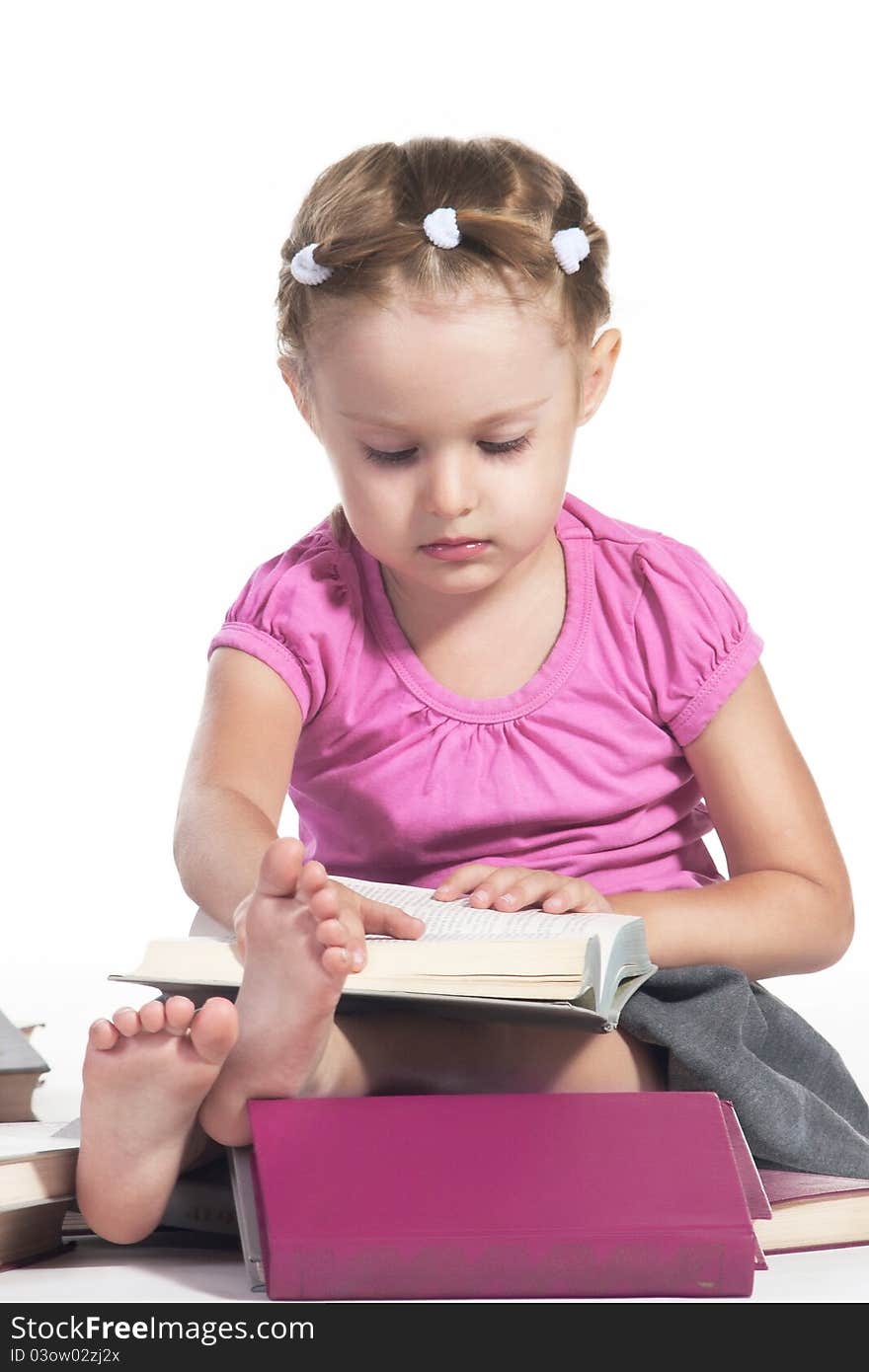 Little girl with books