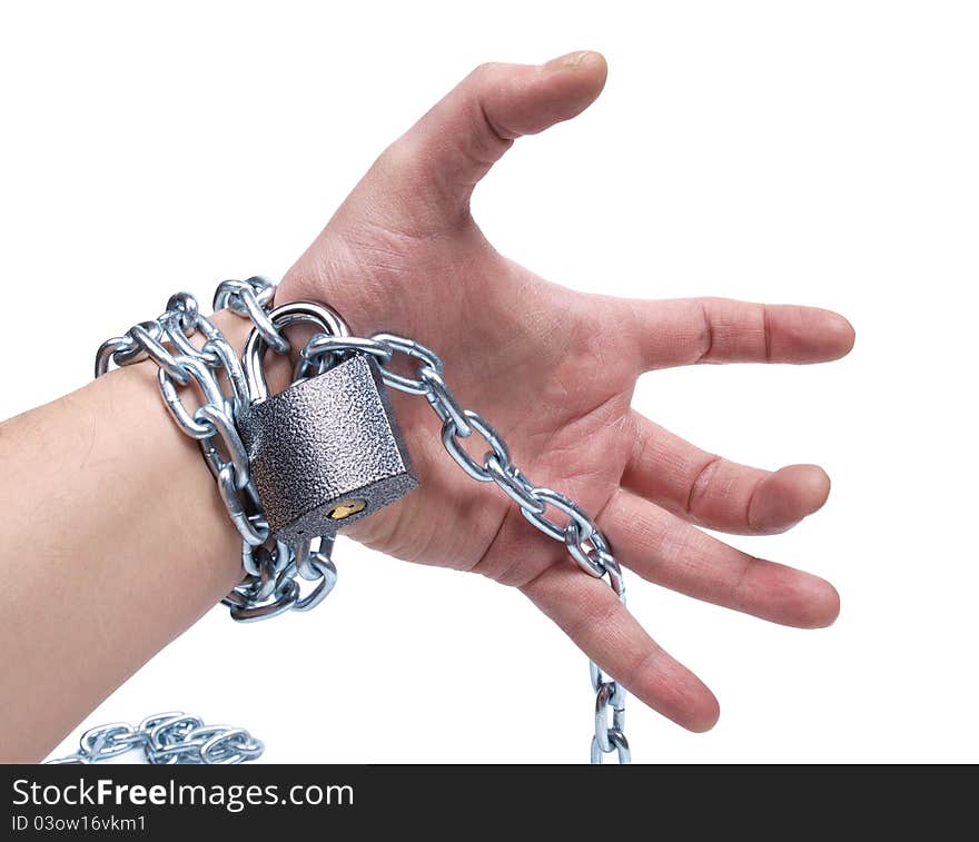 Color photo of a man's hand and a metal chain. Color photo of a man's hand and a metal chain