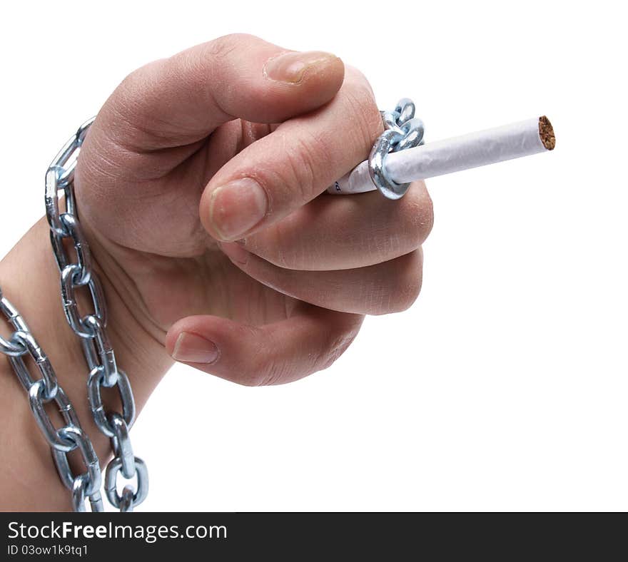 Color photo of a man's hand and a metal chain. Color photo of a man's hand and a metal chain